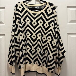 Chic Geometric Black and Cream Sweater